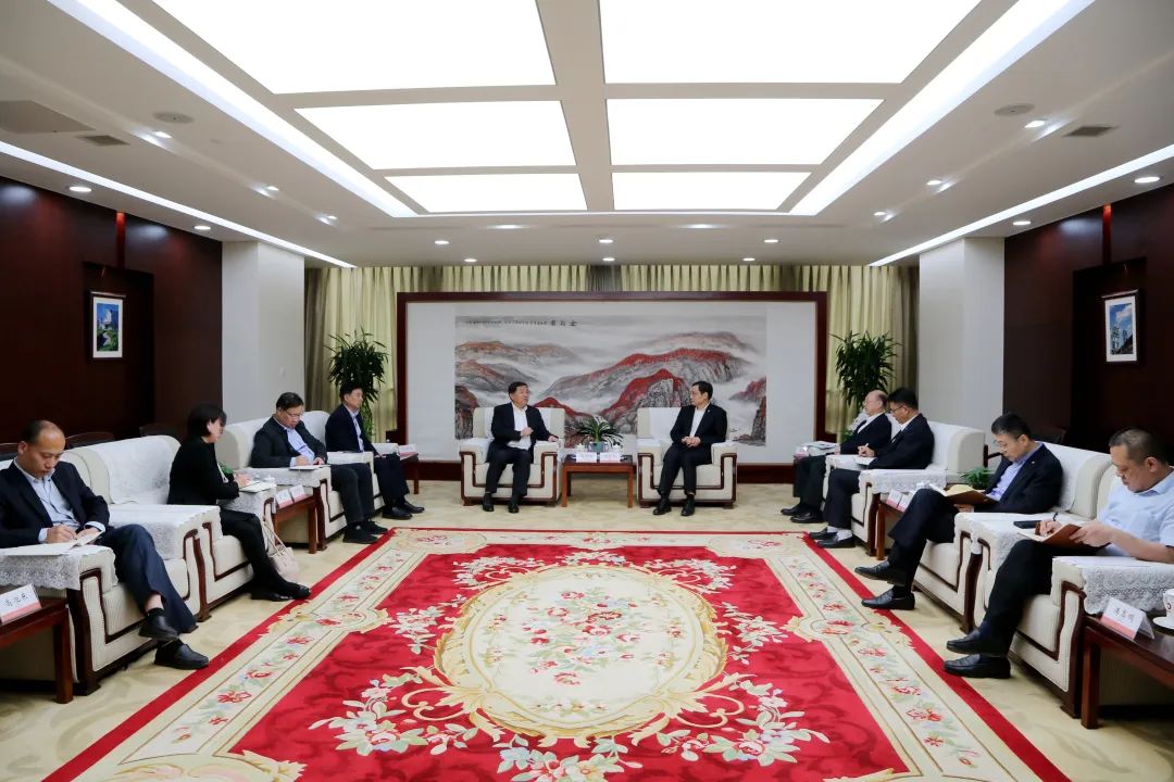 		周育先会见中国水泥协会会长高登榜一行_国际交流_优德88集团有限公司	